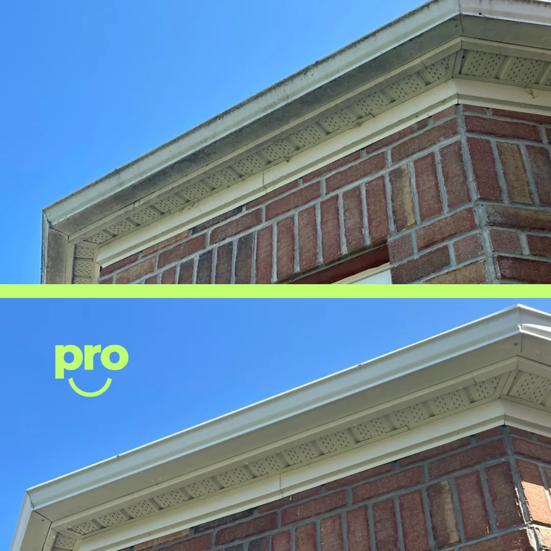 Before and after — Fascia and trim detail on a brick home.